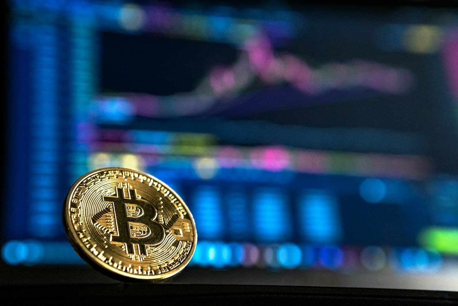 A gold-colored bitcoin coin