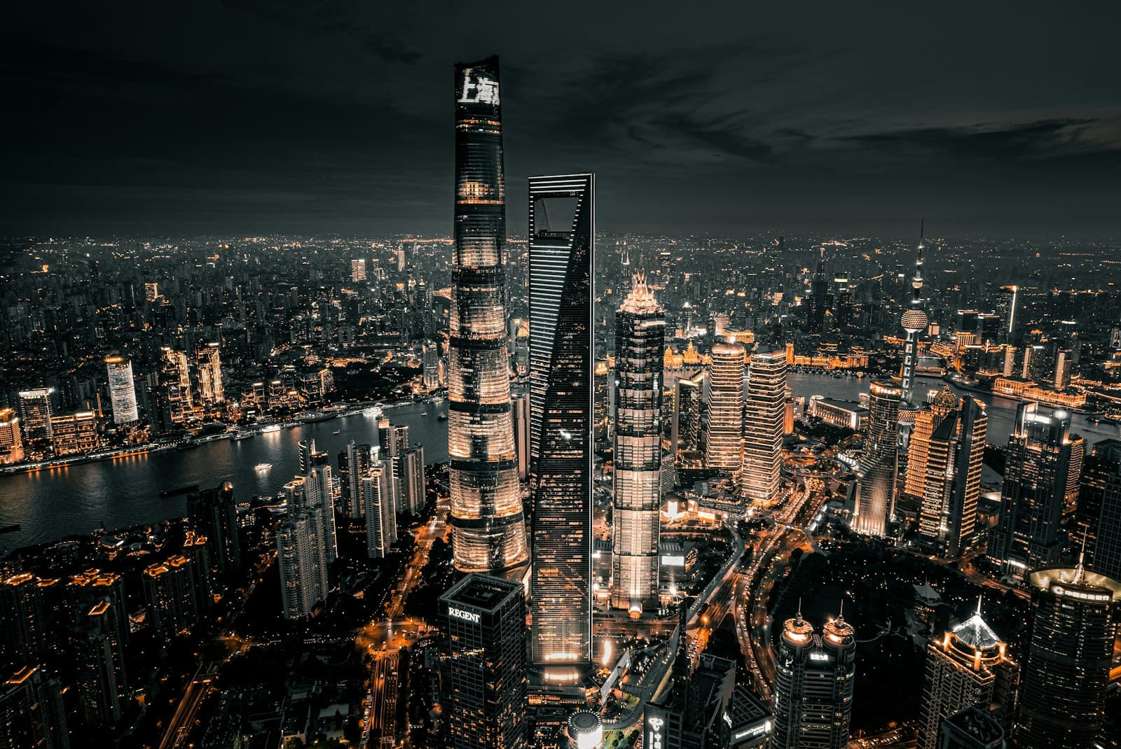 An aerial night view of the Shanghai skyline along the Huangpu river
