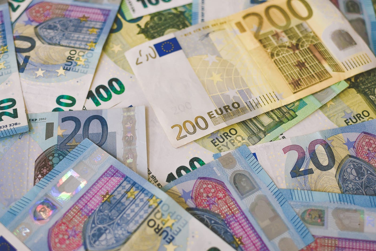 A scattered pile of euro banknotes
